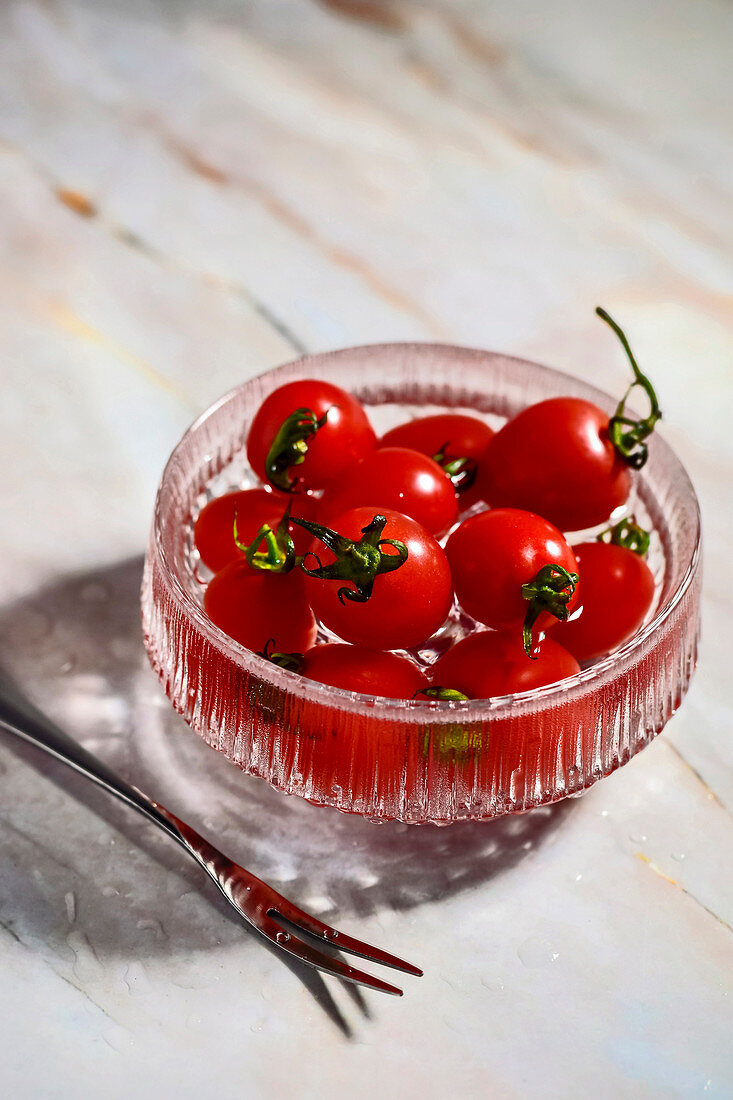 Tomatoes in a glass bowl