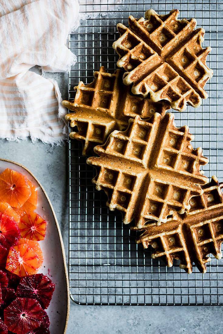 Gluten free waffles with sliced blood oranges