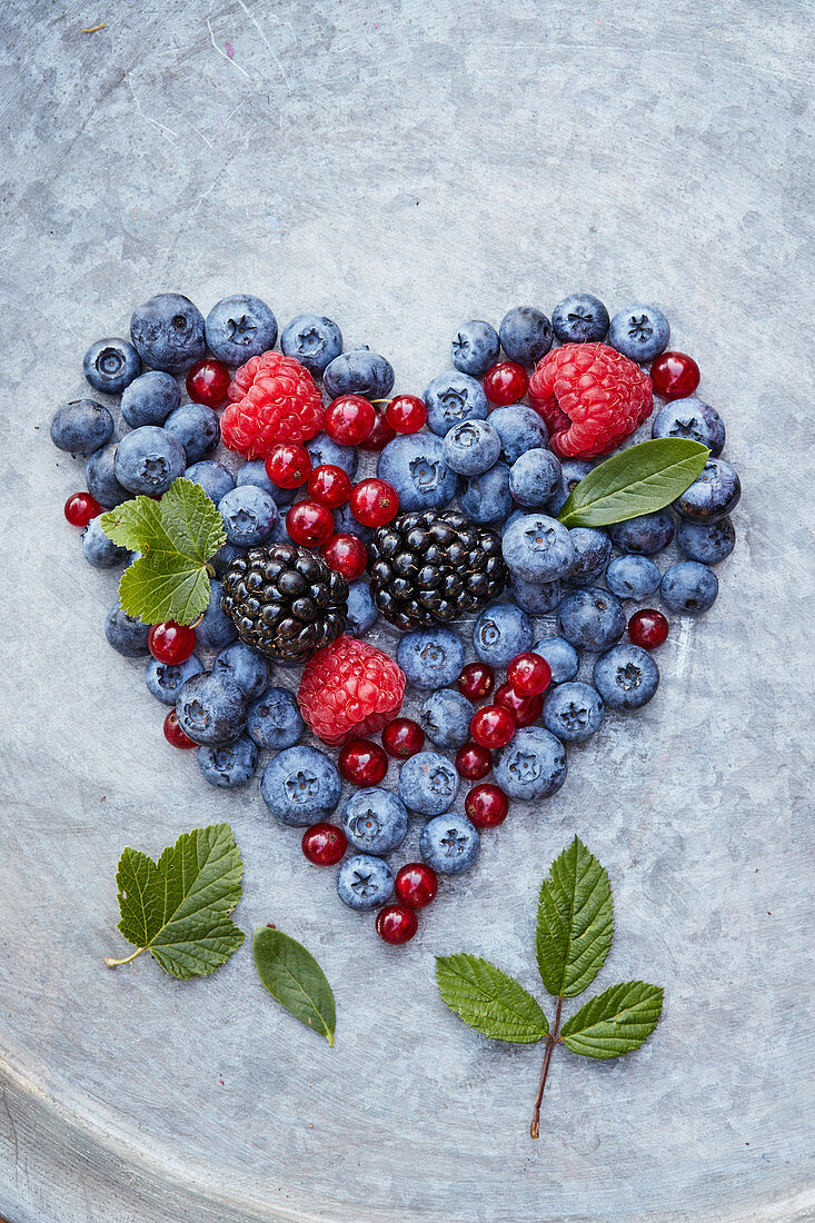 Berry heart on a gray background