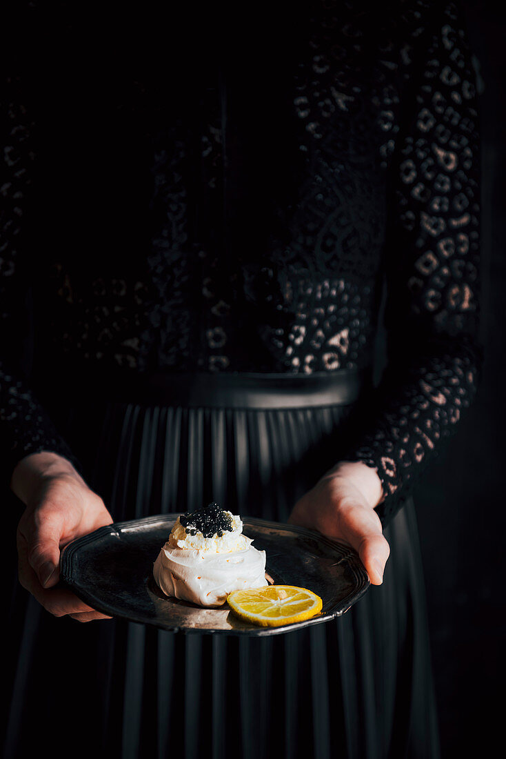 Mini Pavlova with black caviar