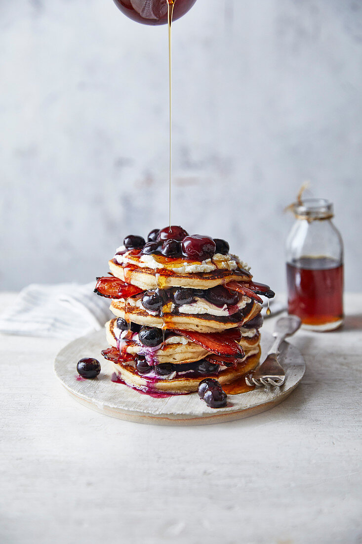 Best ever fluffy American pancakes with berry-cherry syrup