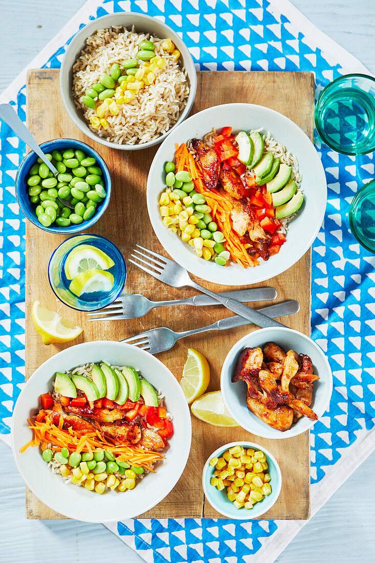 Chicken and vegetable bowls with rice
