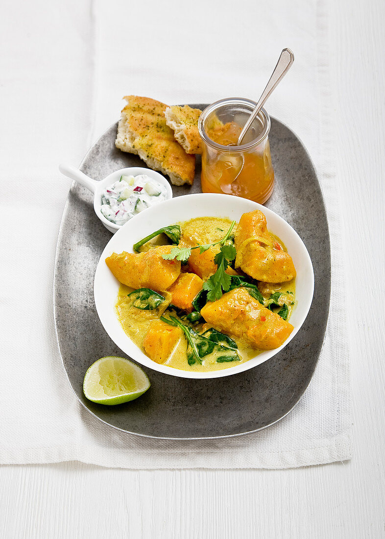 Sweet potato and spinach curry with coconut milk and coriander