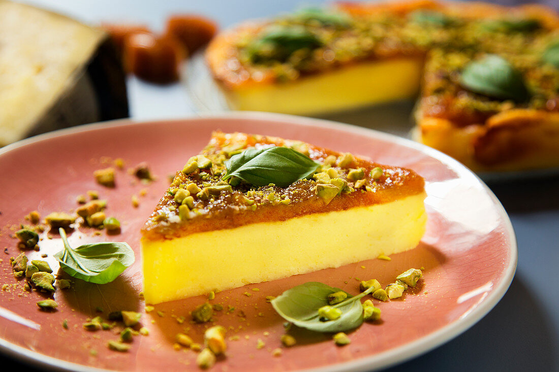 Cheesecake with quince jelly and pistachios