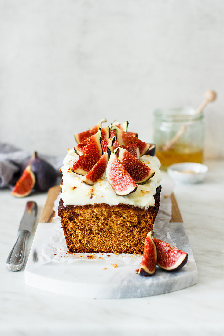 Honey cake with cream cheese frosting and figs