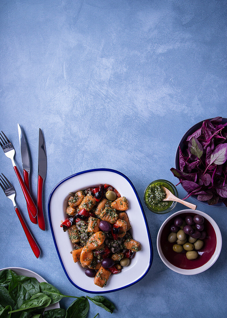 Red gnocchi with cashews, cowpeas and baby spinach