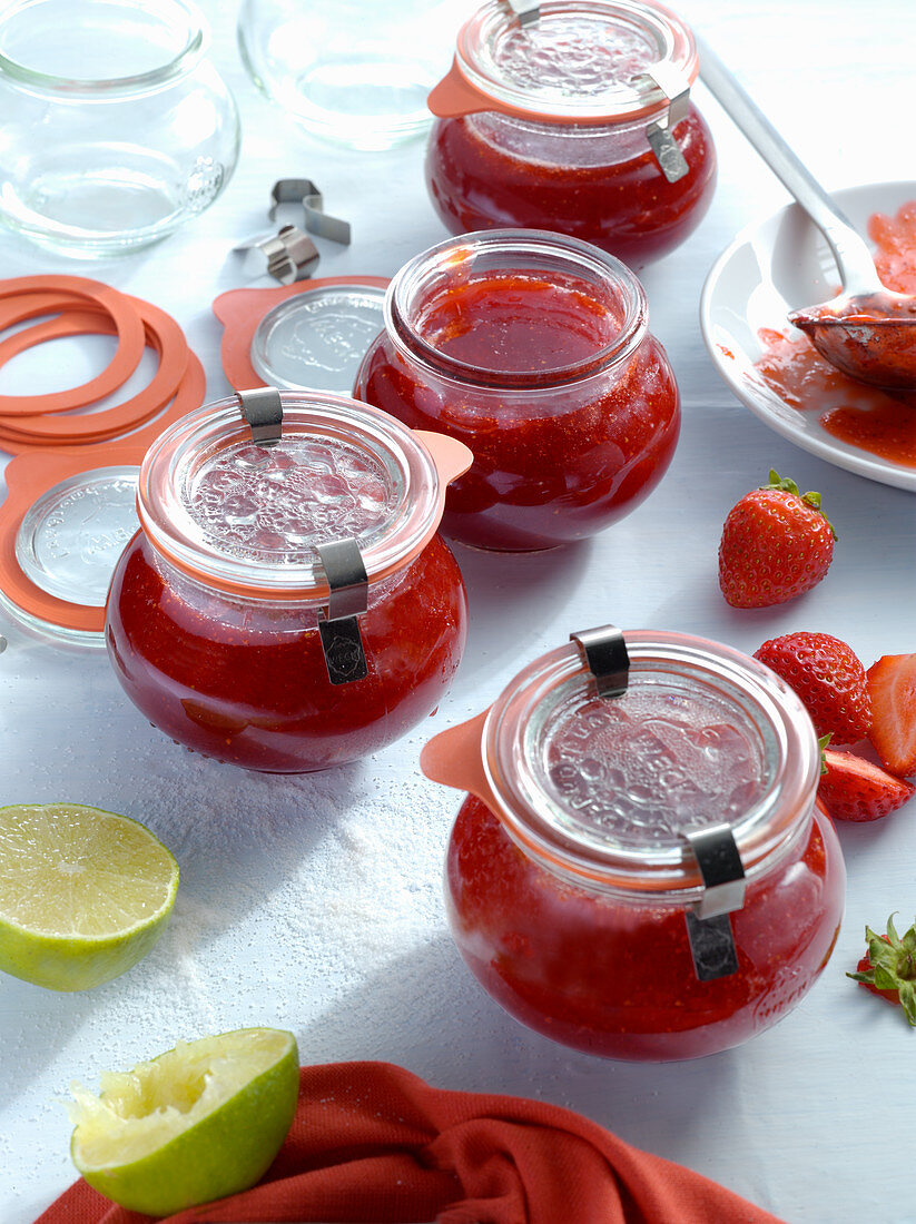 Strawberry jam in preserving jars