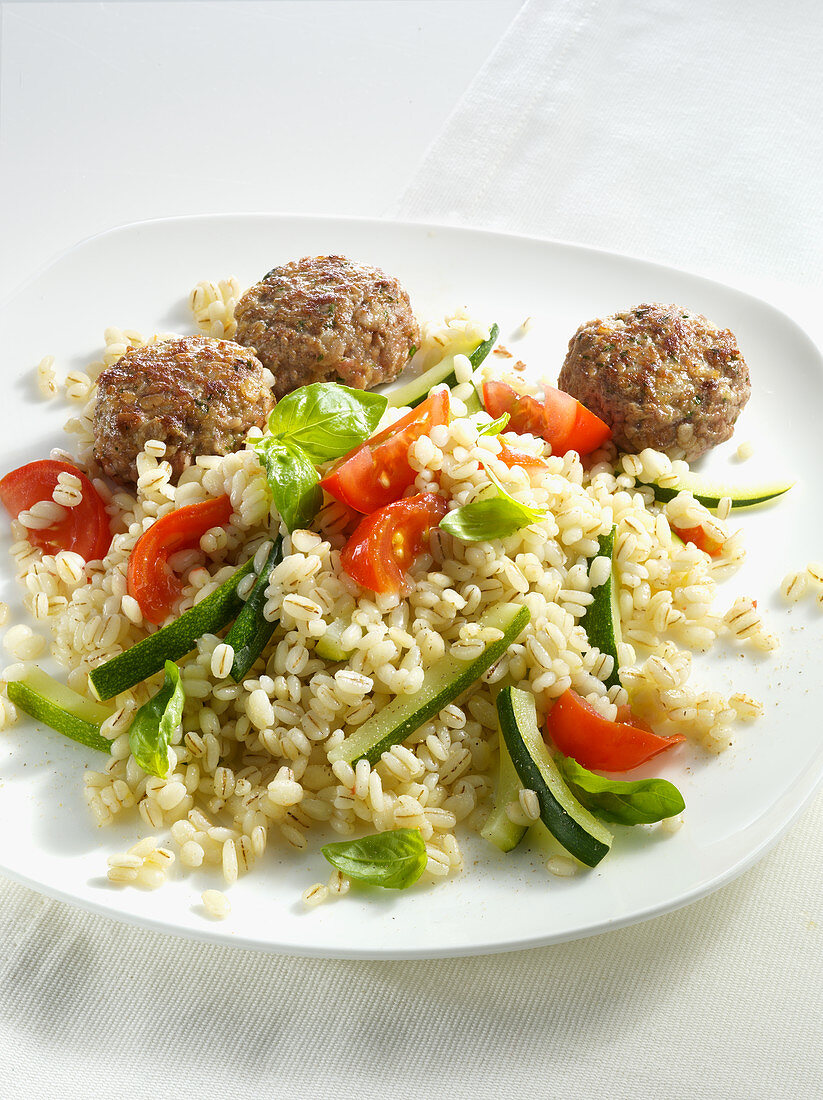 Barley with vegetables and meatballs