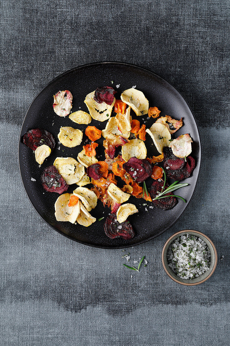 Colourful vegetable crisps with rosemary and sea salt