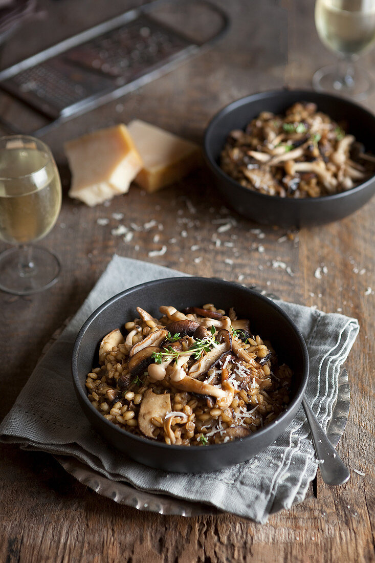 Mushroom risotto with Parmesan served with white wine