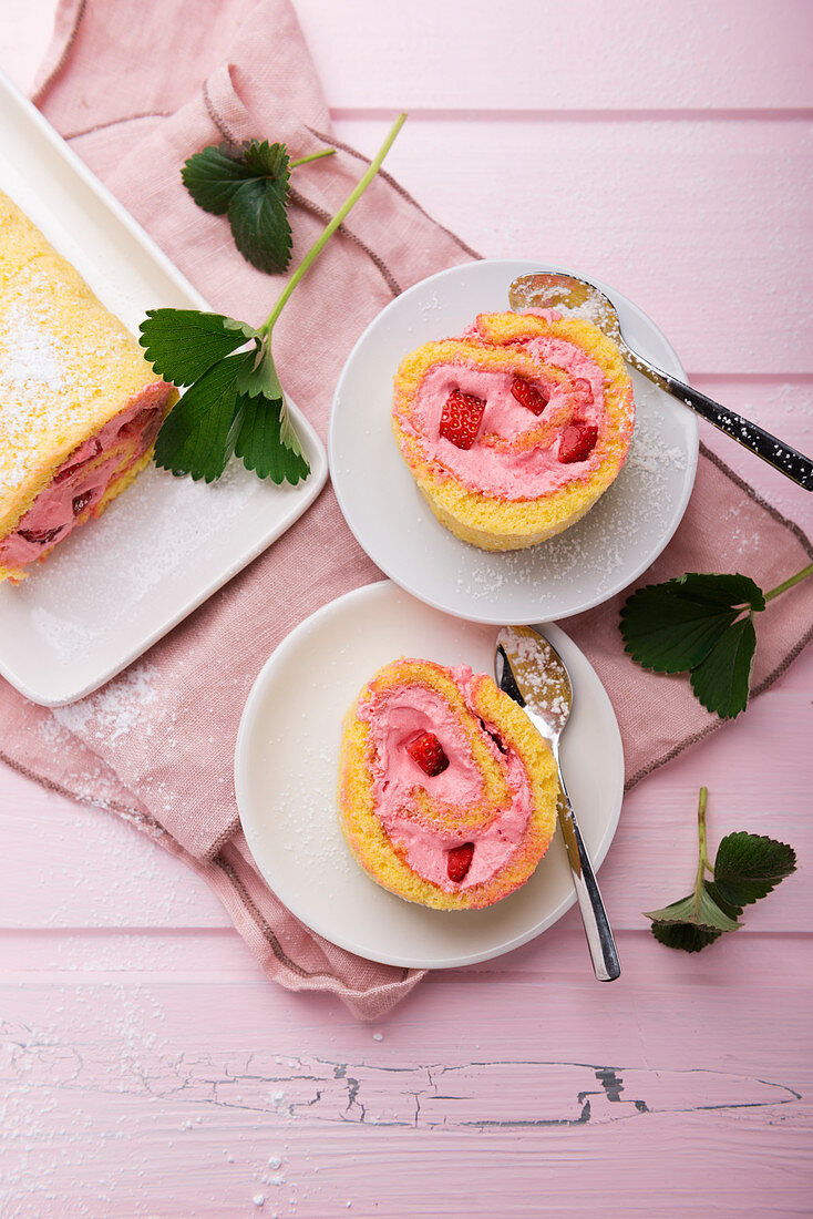 Swiss roll with whipped soya cream and strawberries
