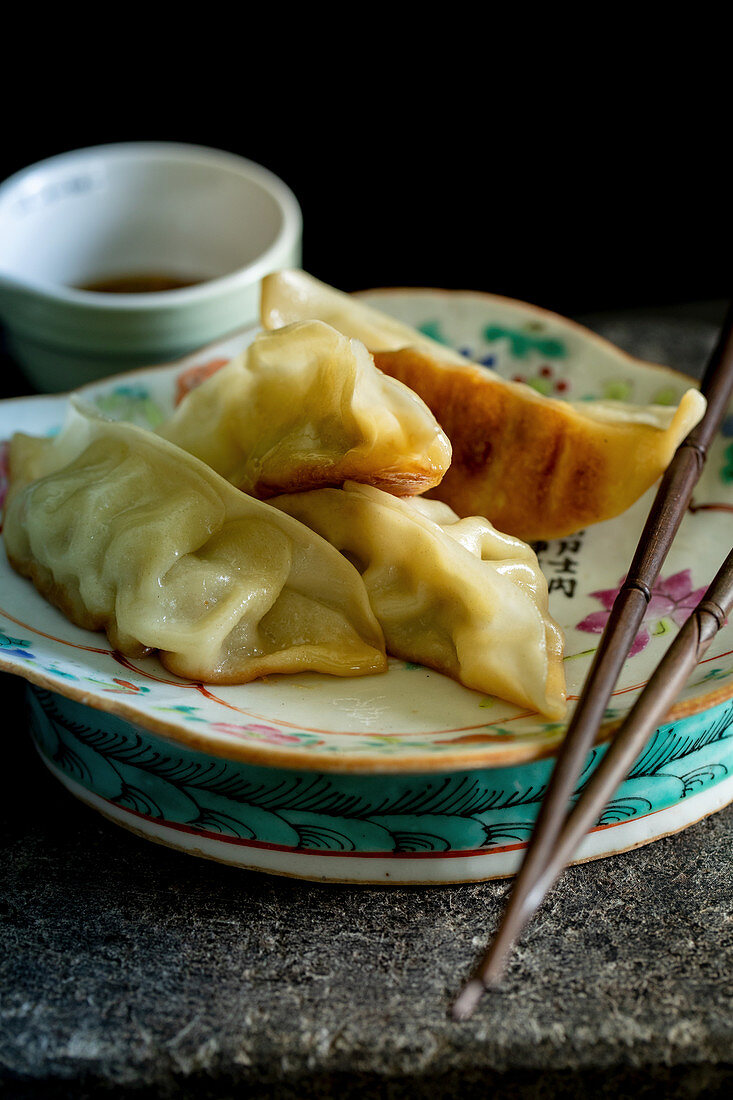 Dumplings with soy sauce (Asia)