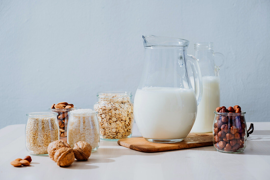 Ingredients for preparing vegan milk on table