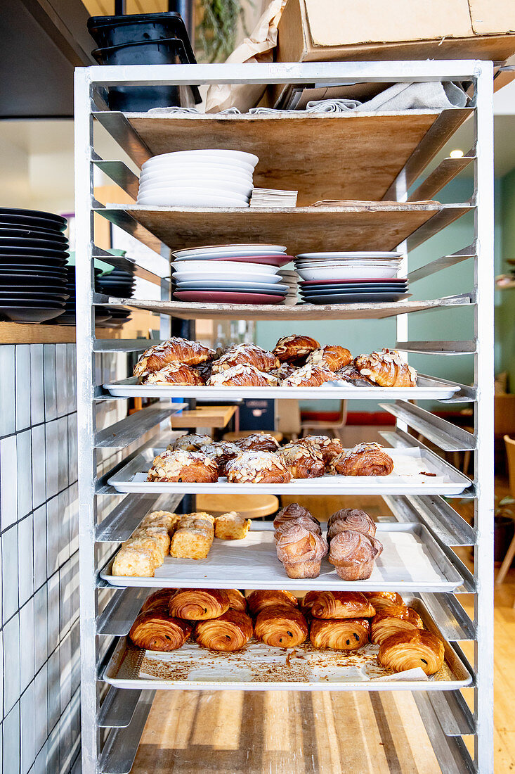 Sweet pastries on a shelf in a bakery