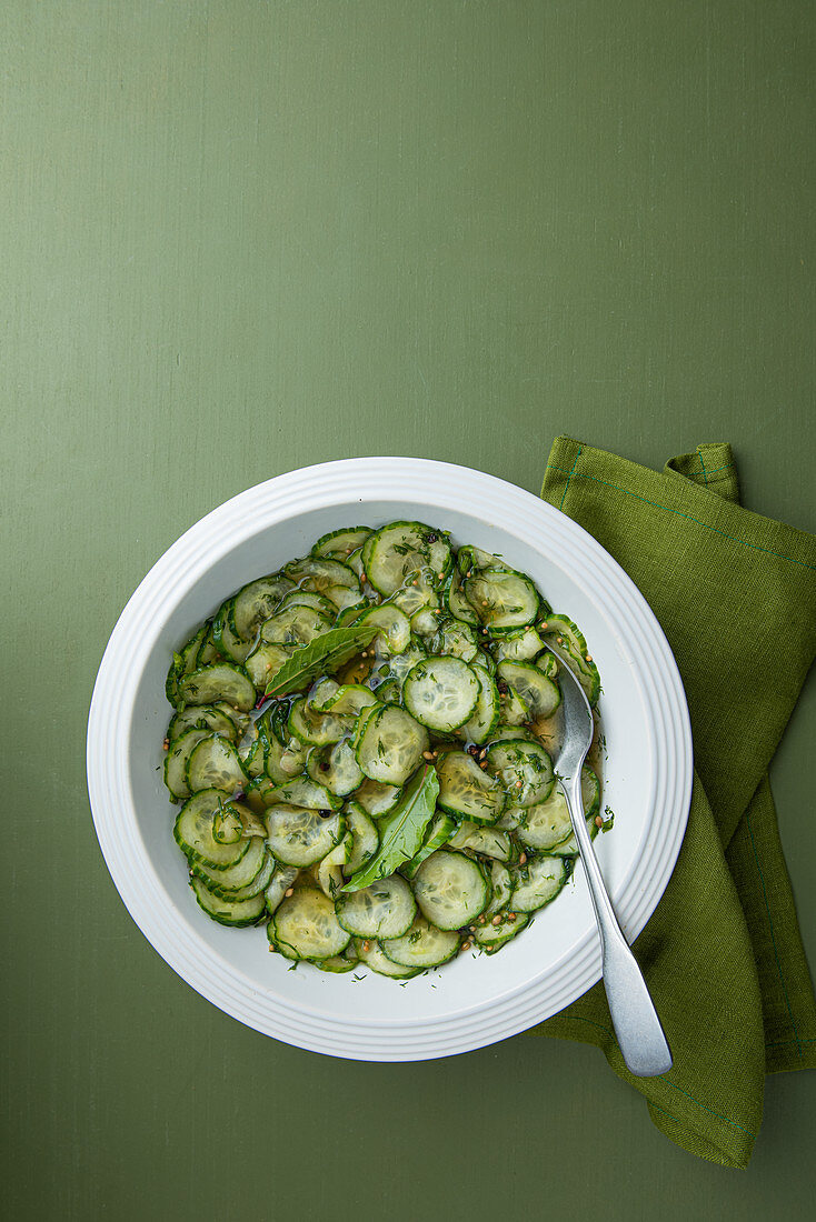 Sweet pickle cucumber salad with dill and mustard seeds