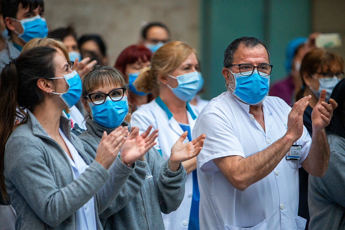 Healthcare workers clapping during Covid-19 outbreak