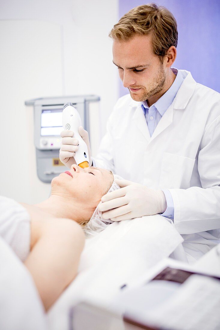 Dermatologist giving thermage treatment