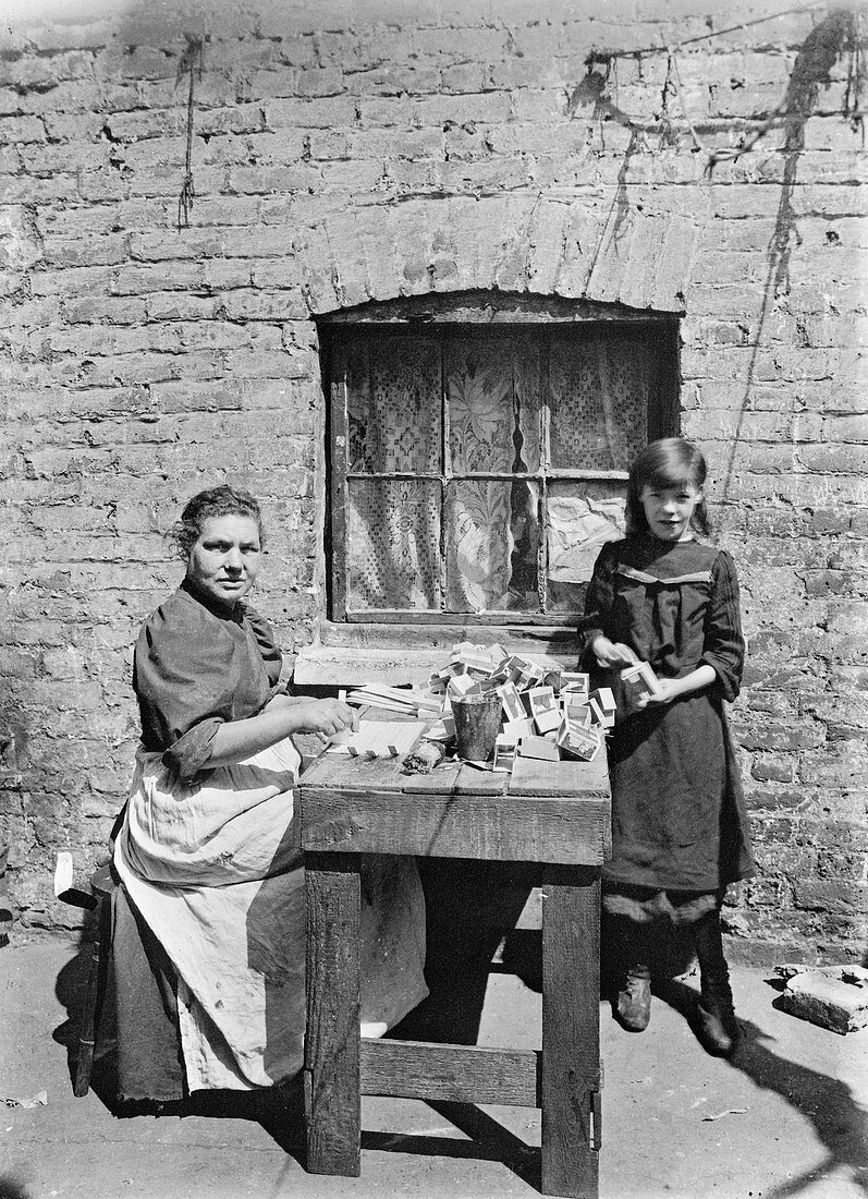 Assembling match boxes at home, 1900s