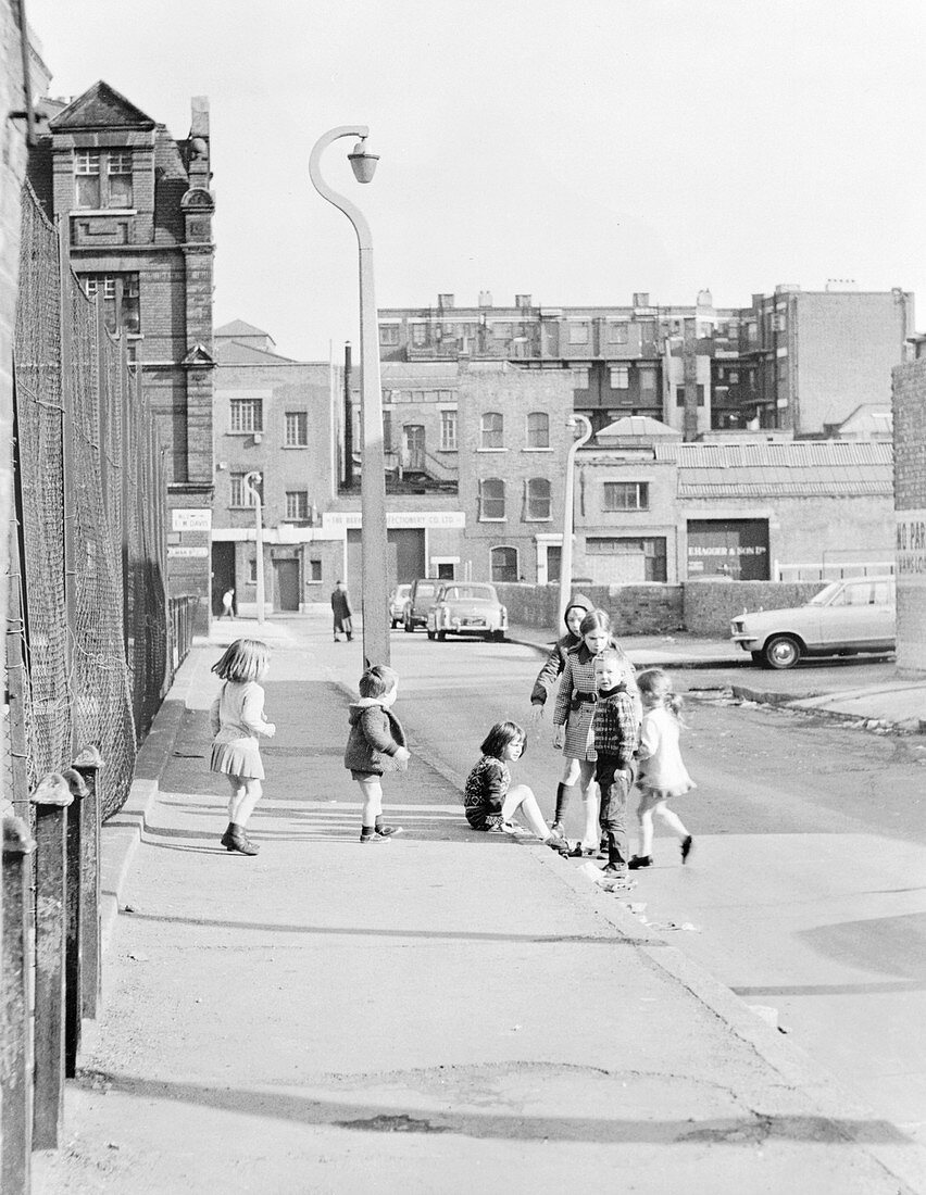 Children playing on Hopetown Street, London