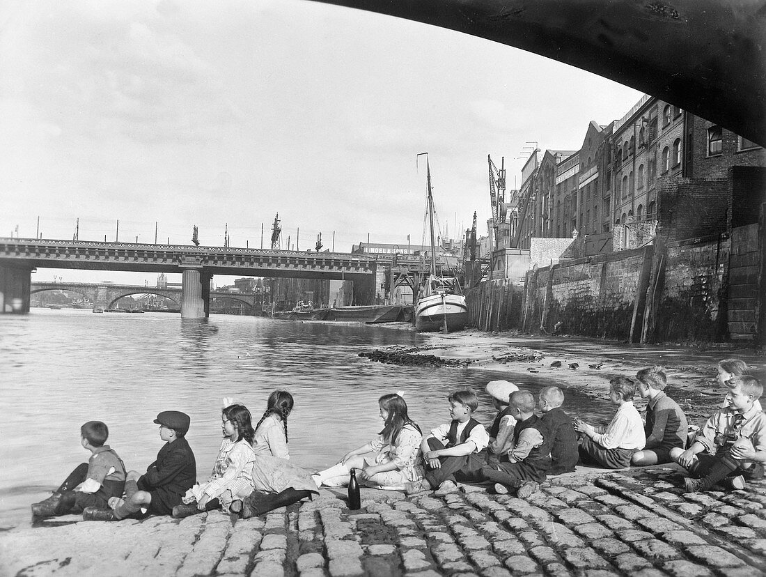 Cobbled causeway under Southwark Bridge, London, c1930