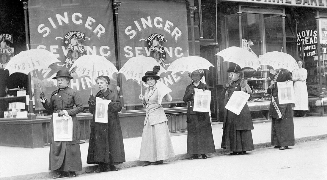 A parasol parade selling The Suffragette newspaper, 1914
