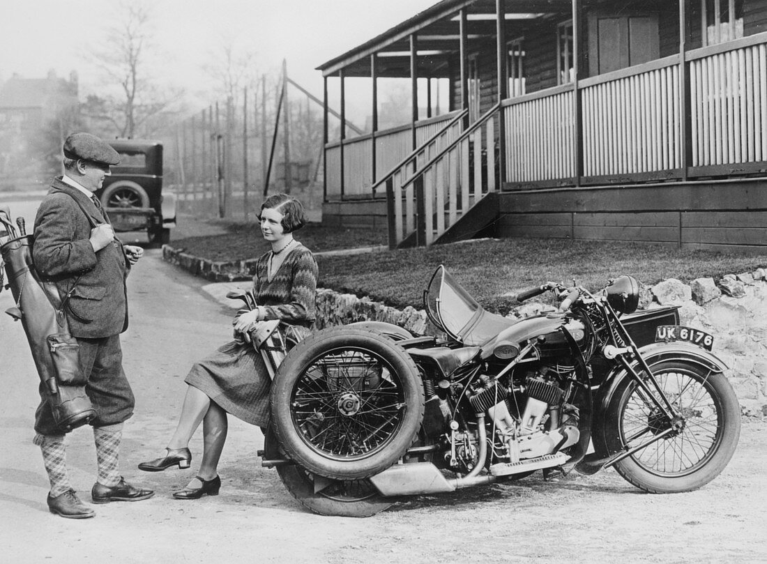 Golfers with a 1939 AJS and sidecar