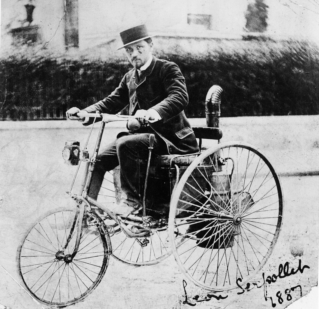 Leon Serpollet on his first steam tricycle, 1887