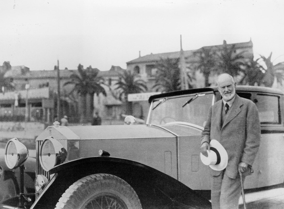 Sir Henry Royce, with Rolls-Royce car