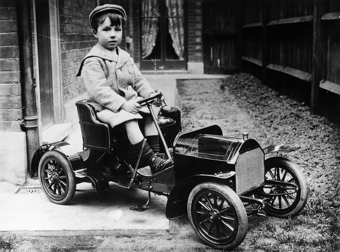 Boy in 1908 Mercedes 28 32 hp pedal car, c1908