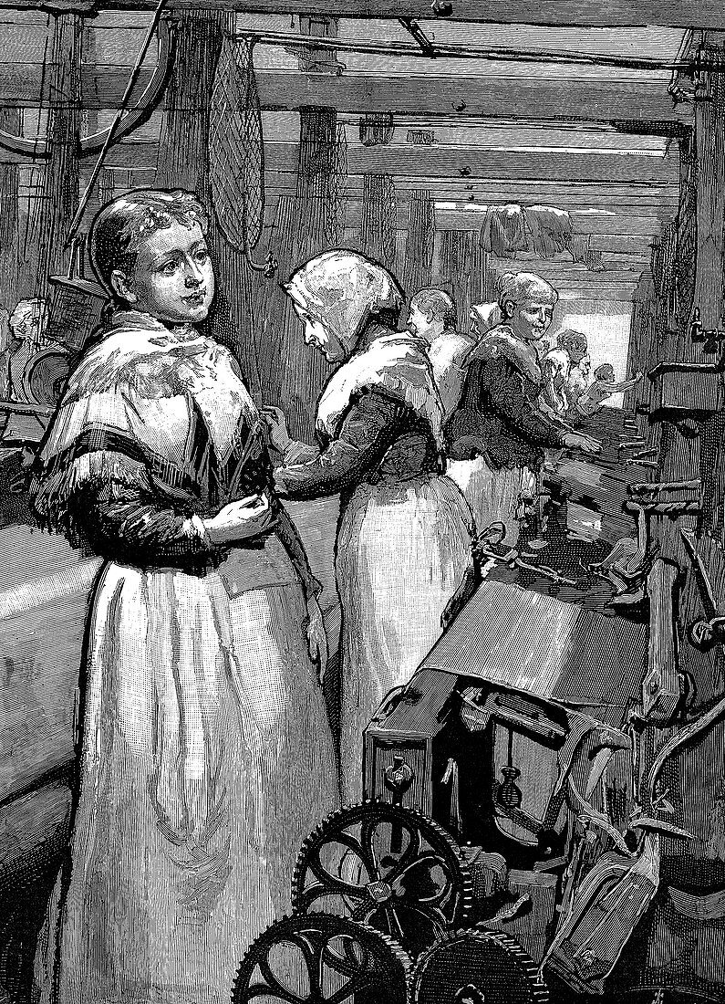 Women operatives tending power looms in a woollen mill