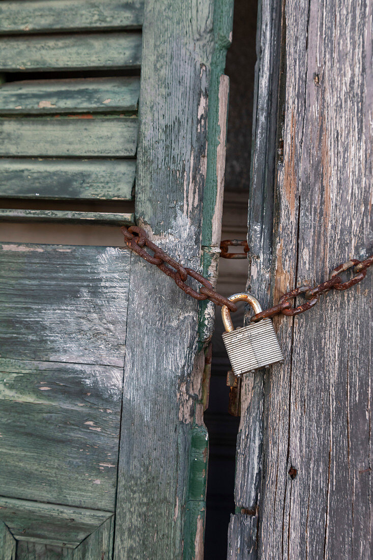 Padlock and chain on a door