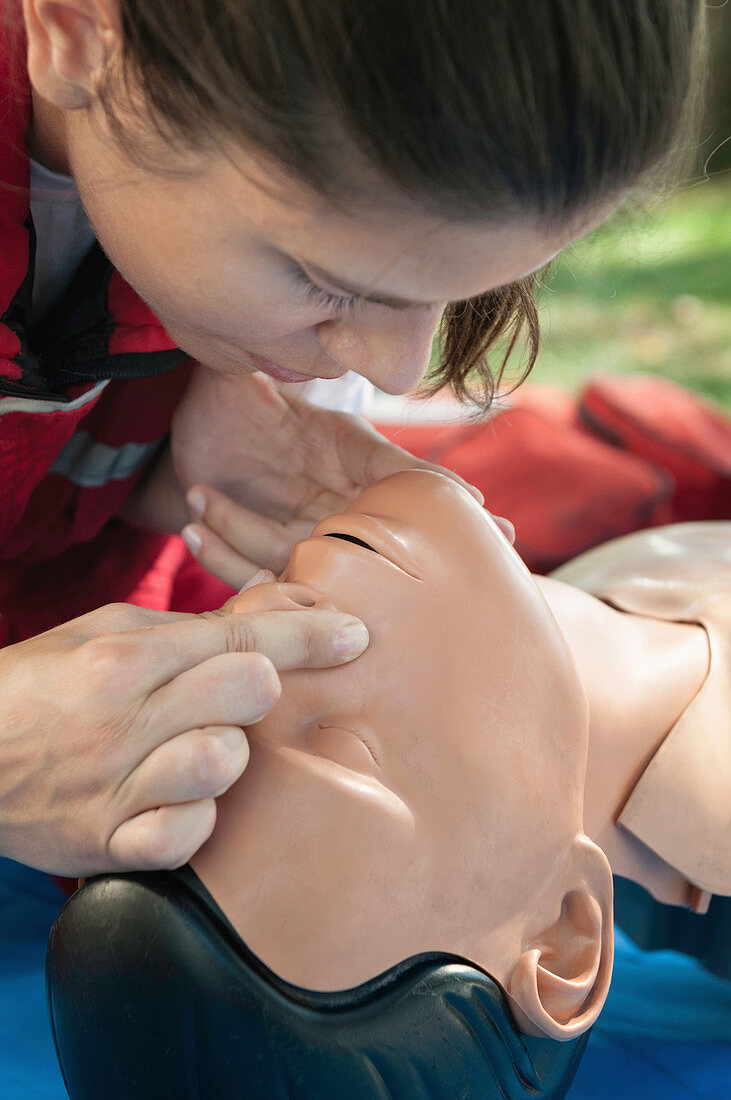 Mouth to mouth practice on CPR dummy