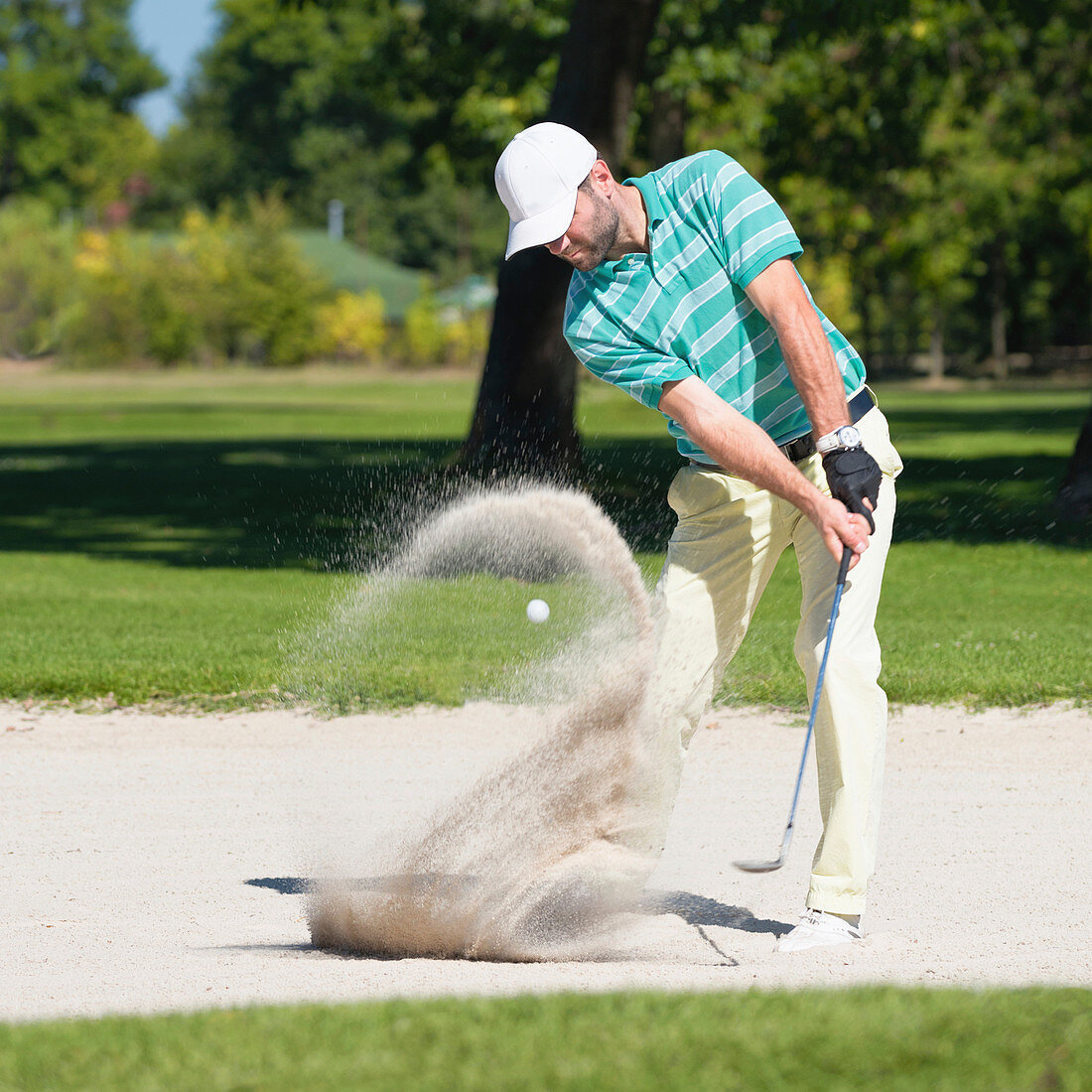 Golfer in sand trap
