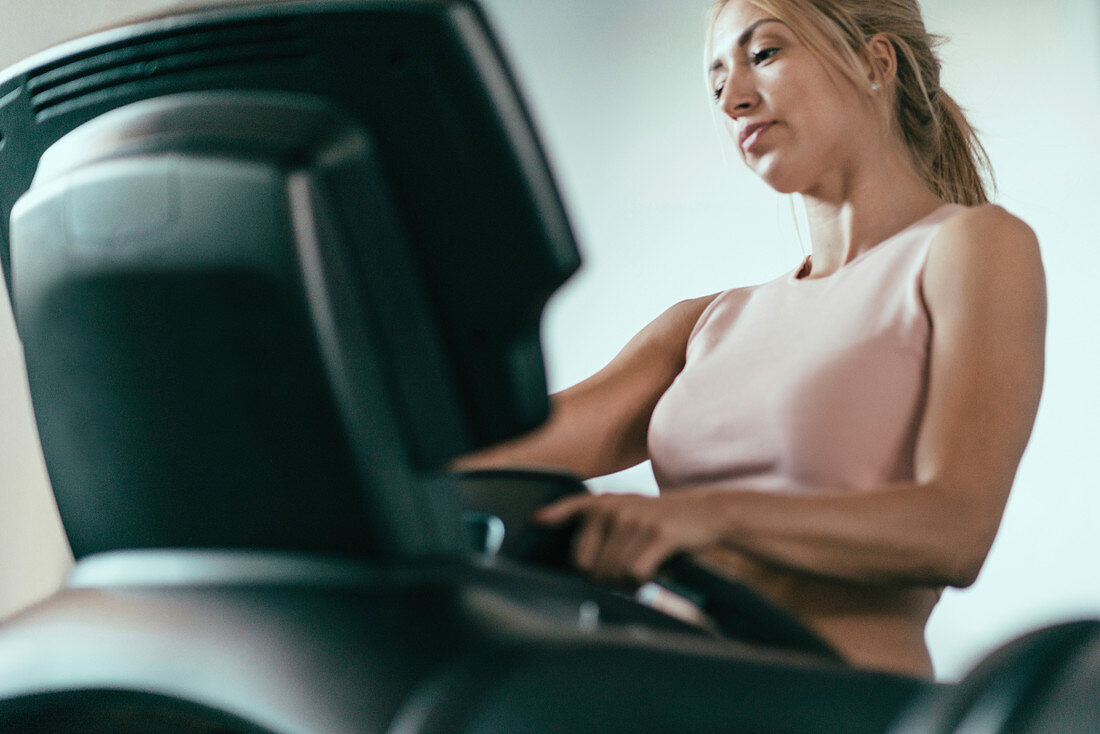 Woman using a treadmill