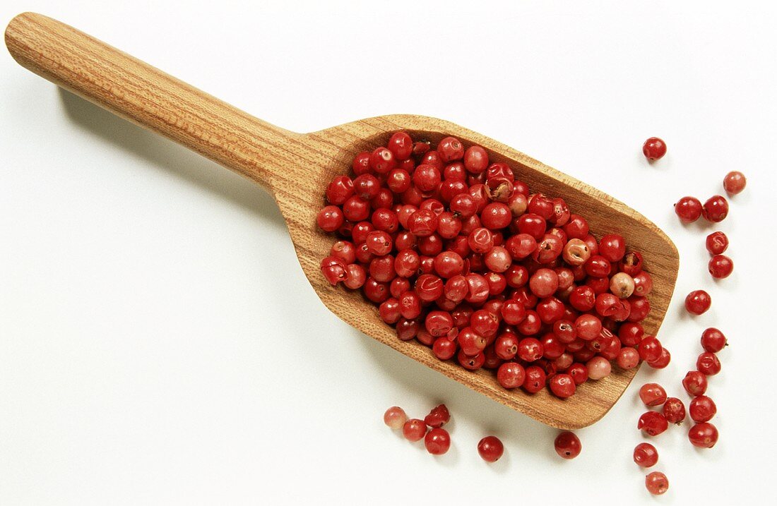 Red Peppercorns on a Wooden Scoop
