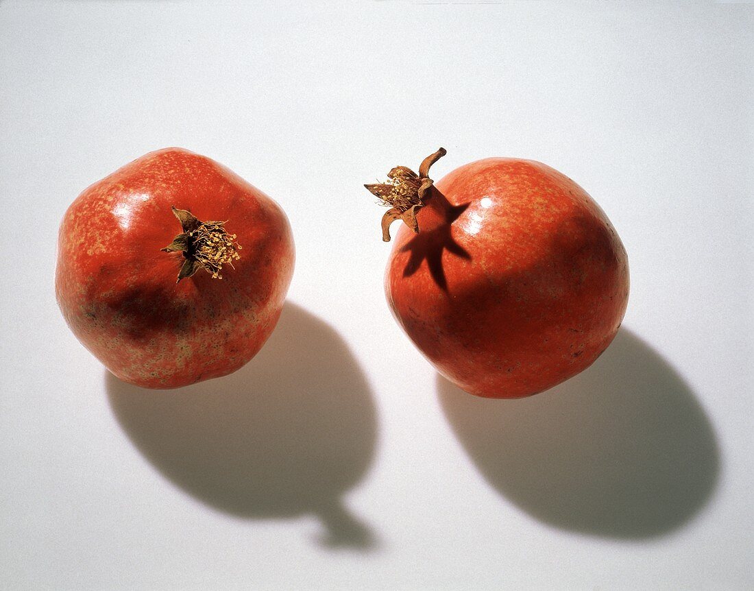 Two Whole Pomegranates
