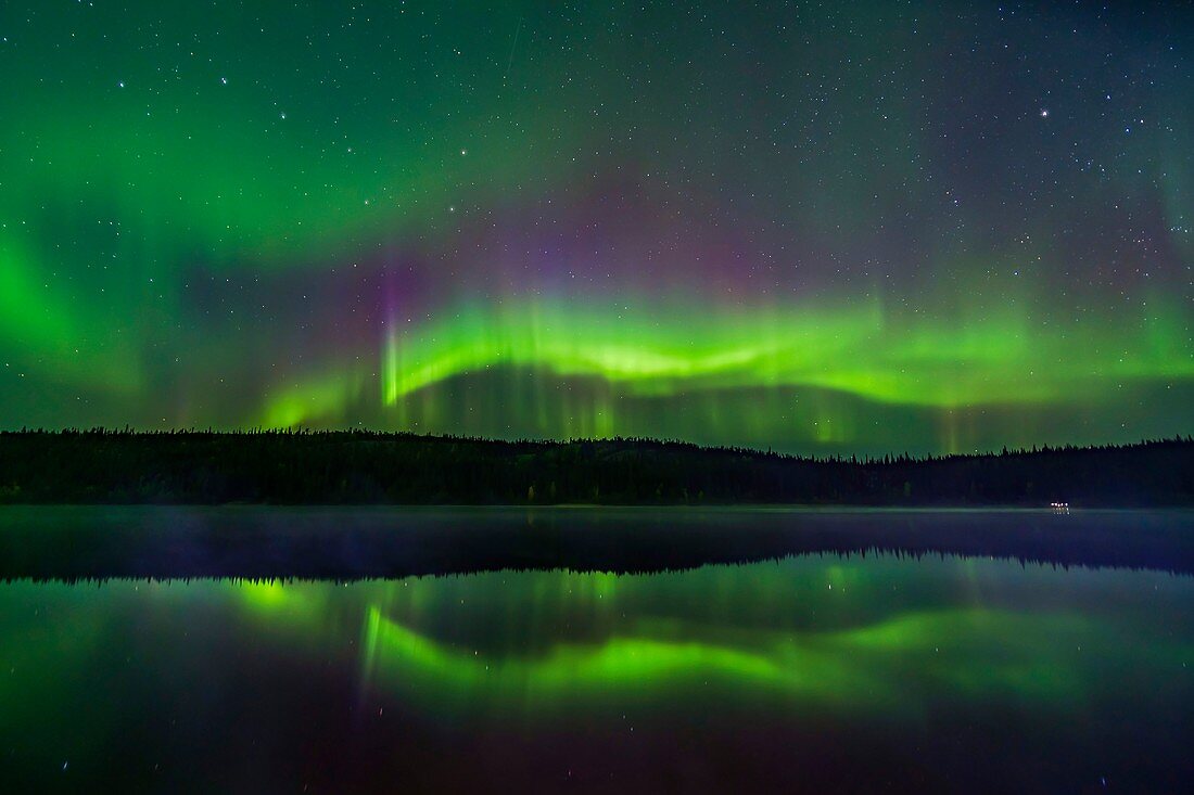 Northern lights reflected in a lake