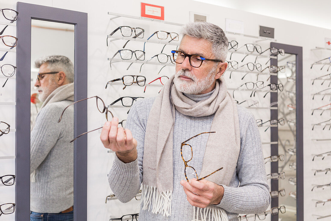 Man trying prescription glasses