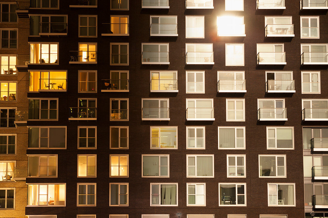 Day to night image of an apartment block
