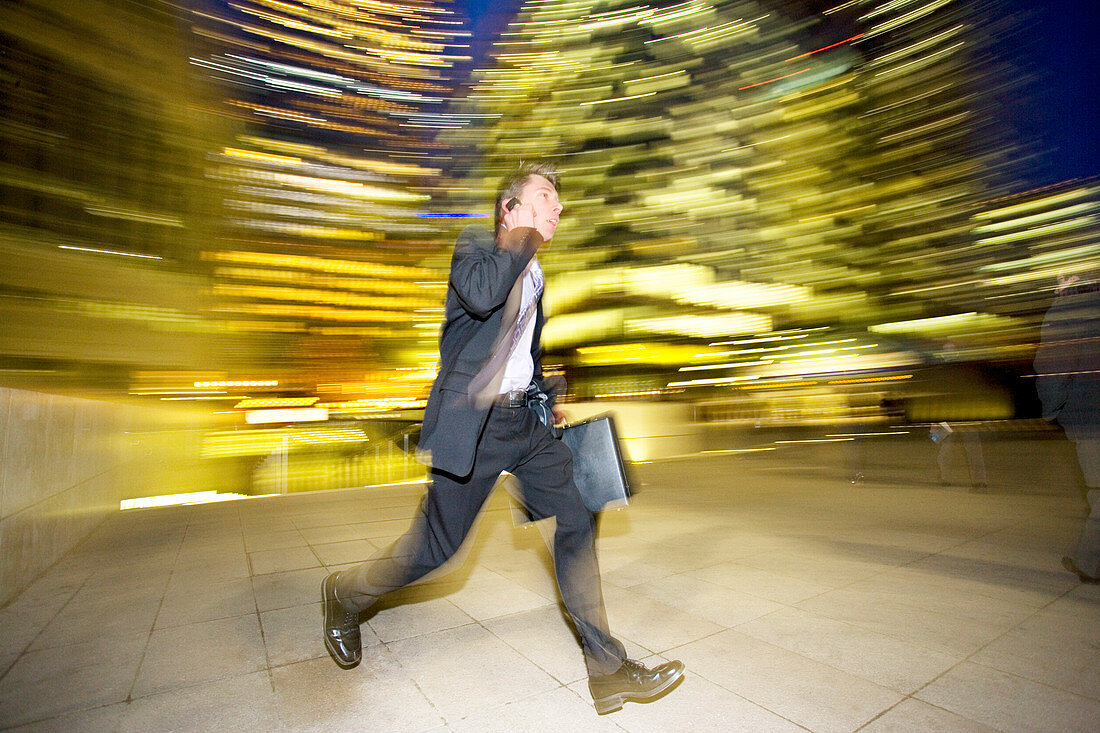 Businessman leaving the office at night