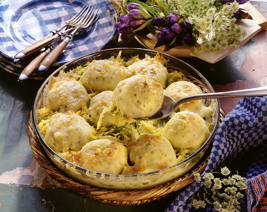 Old Bavarian dumpling casserole in round glass dish