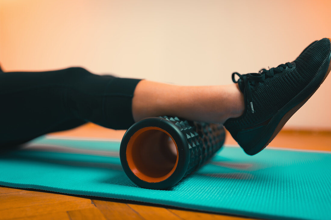 Using foam roller for muscle and fascia massage