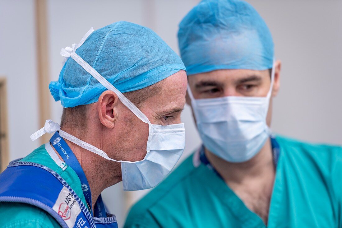 Spinal surgeons conferring