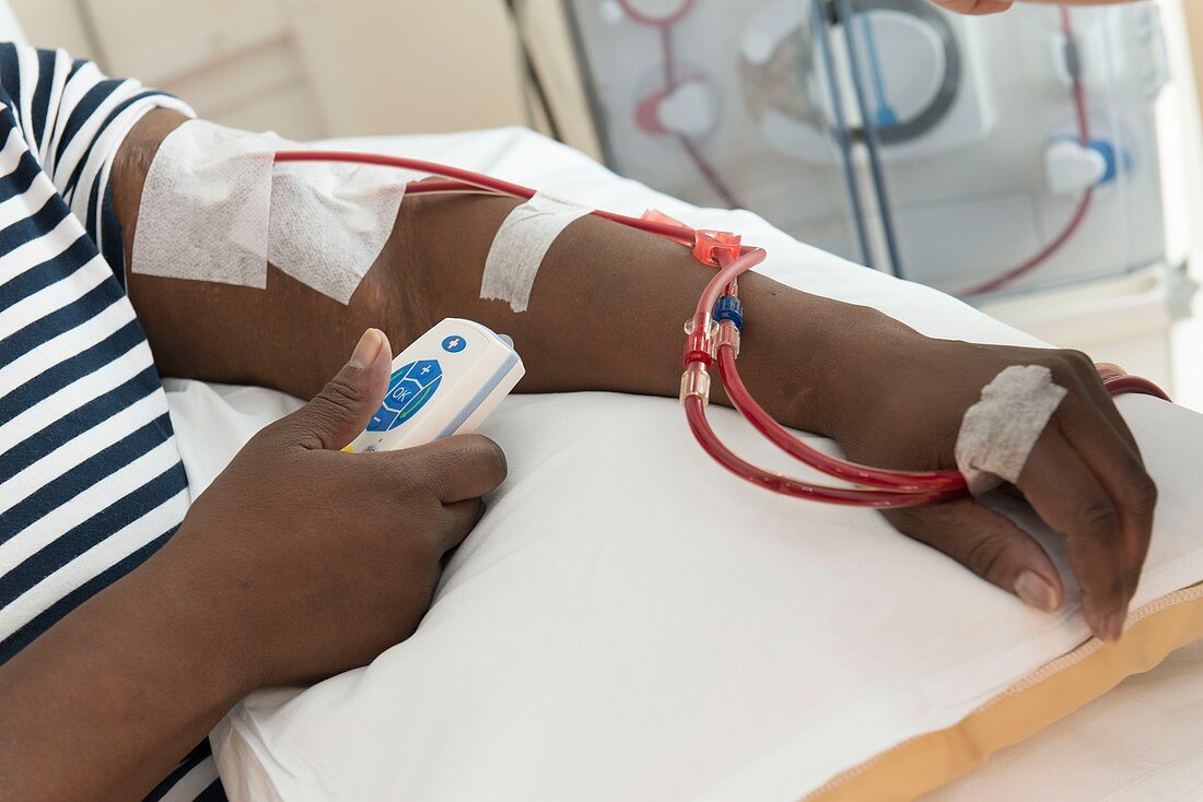 Kidney dialysis patient monitoring herself