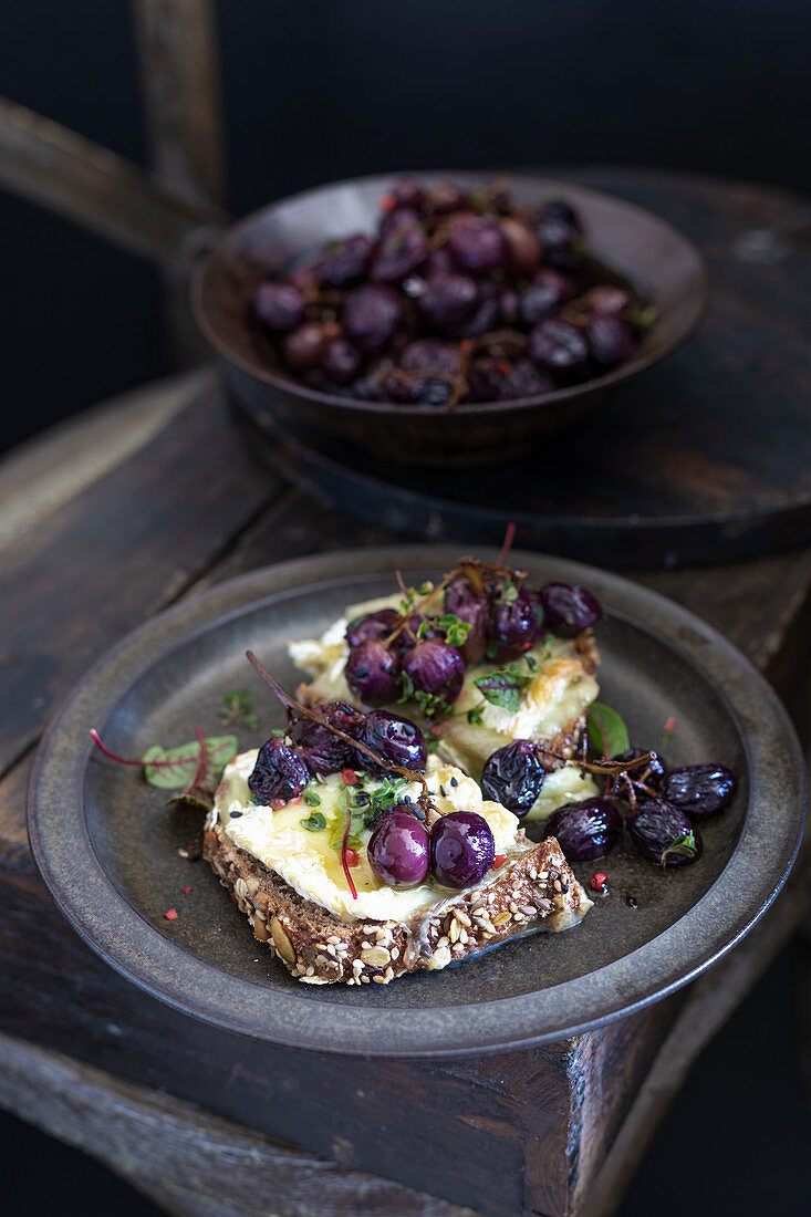 Whole wheat toast with stilton and roasted grapes