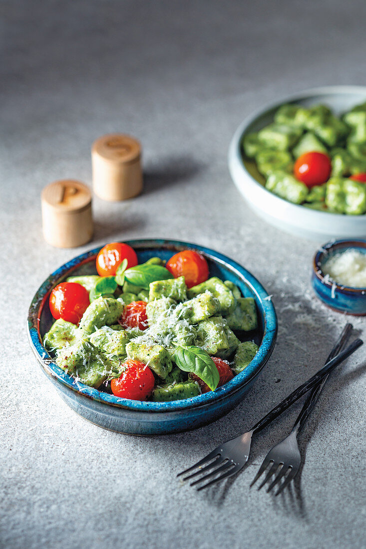 Vegeterian spinach and parmesan gnocchi with vine tomatoes