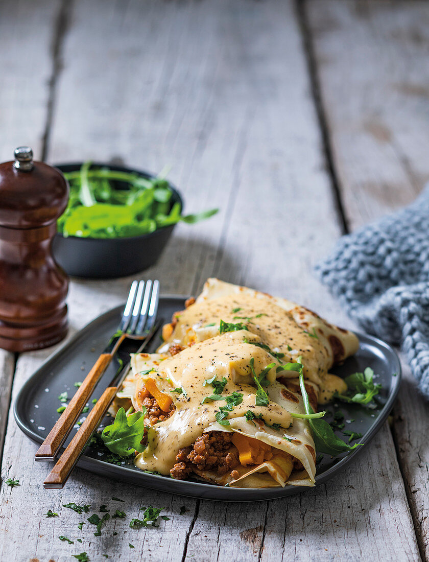 Savoury pancakes with butternut and mince sauce