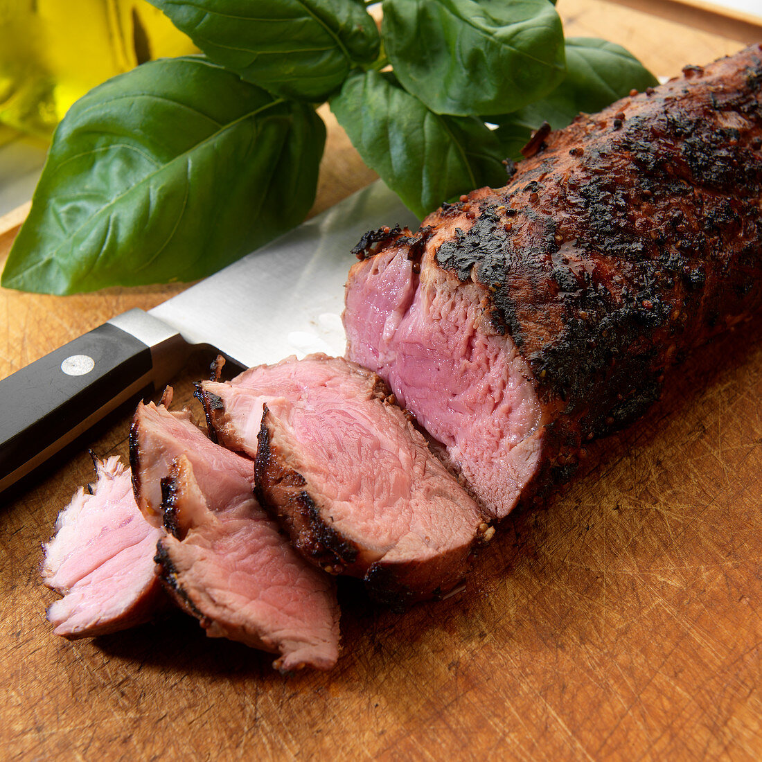 Sliced grilled pork tenderloin with herb rub