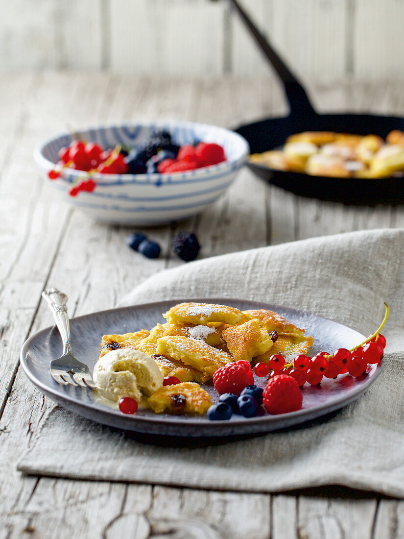 Bergisches pastry with vanilla ice cream and berries