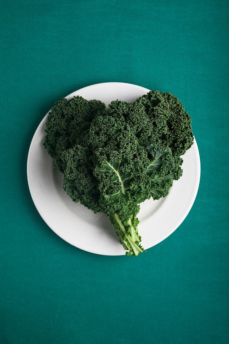 Heart shaped kale leaves on a plate